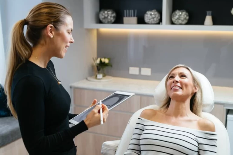 Registered nurse Shannon performing cosmetic injectable consultation