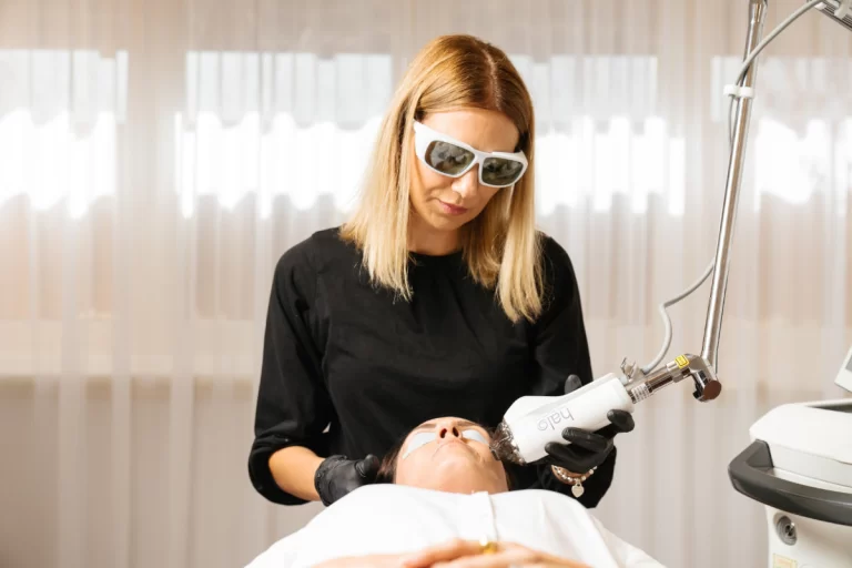 Dermal clinician Corina performing a Halo treatment